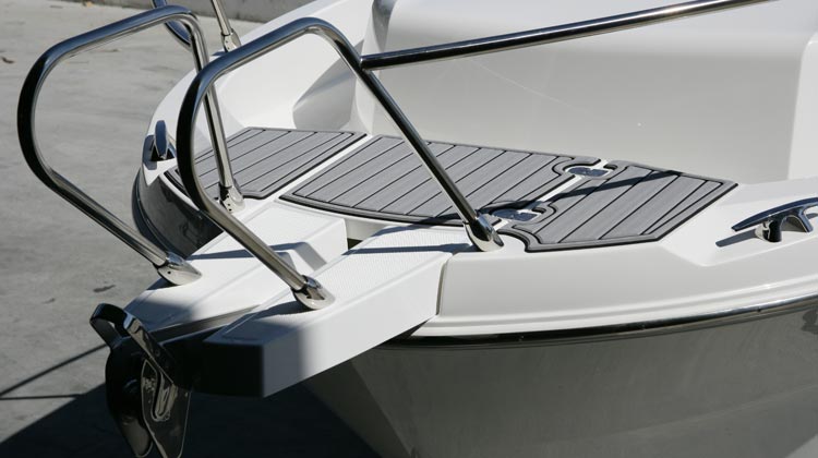 Anchor roller and concealed recess for optional windlass